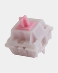 A single ThicThock Marshmallow Linear Switch with a light pink nylon housing and pink POM stem.